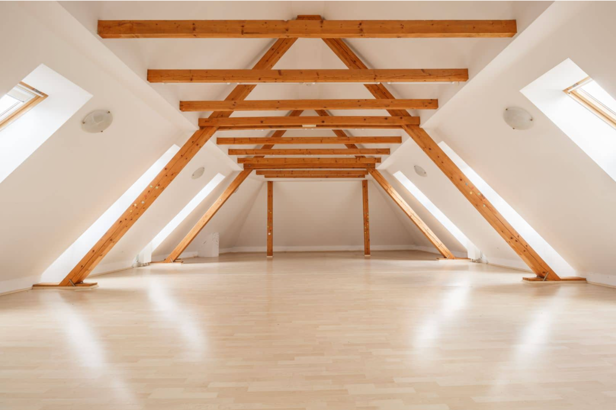 Bright attic movement room at Mekinje Monastery